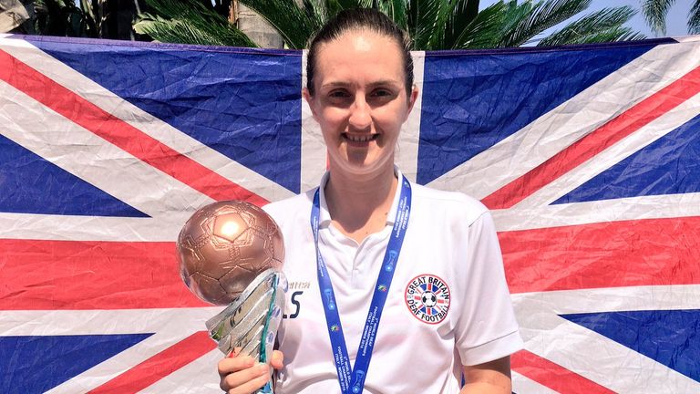 Claire Stancliffe with the Deaf World Cup third-place trophy and her bronze medal