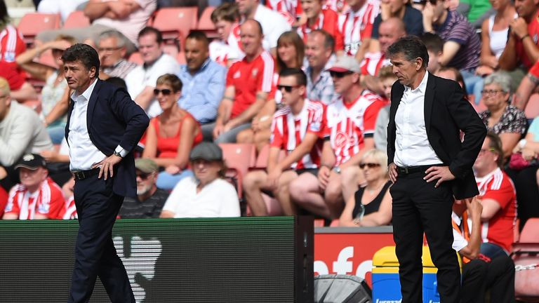 Walter Mazzarri and Claude Puel watch on