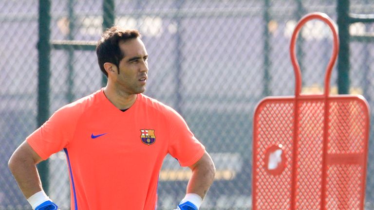 Barcelona's Chilean goalkeeper Claudio Bravo looks on during a training session at the Sports Center FC Barcelona Joan Gamper in Sant Joan Despi