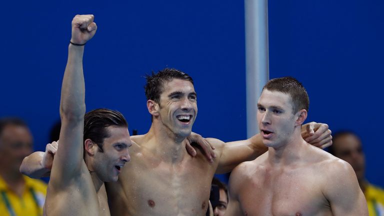 RIO DE JANEIRO, BRAZIL - AUGUST 13:  Cody Miller, Michael Phelps and Ryan Murphy of the United States celebrate winning gold in the Men's 4 x 100m Medley R