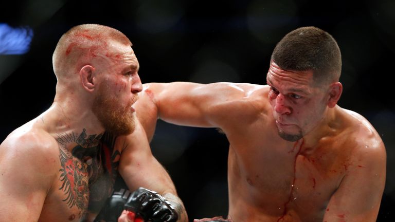 LAS VEGAS, NV - AUGUST 20:  Conor McGregor (L) and Nate Diaz battle during their welterweight rematch at the UFC 202 event at T-Mobile Arena on August 20, 