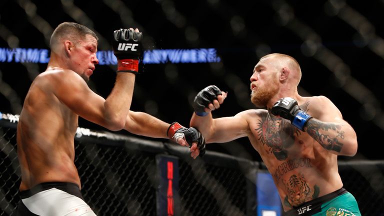LAS VEGAS, NV - AUGUST 20:  Nate Diaz (L) and Conor McGregor battle during their welterweight rematch at the UFC 202 event at T-Mobile Arena on August 20, 