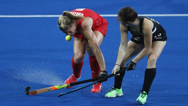 RIO DE JANEIRO, BRAZIL - AUGUST 17:  Crista Cullen (L) of Great Britain is struck in the face by the ball after Kelsey Smith challenges during the Women's 