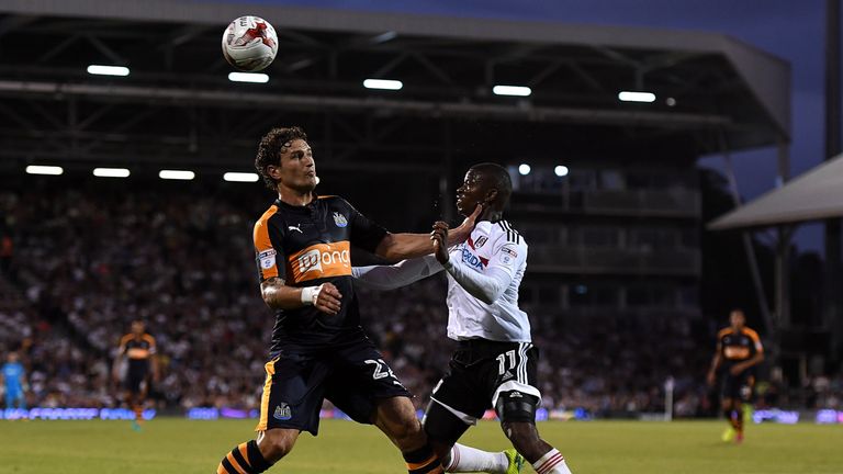 Daryl Janmaat (left) in action against Fulham earlier this season