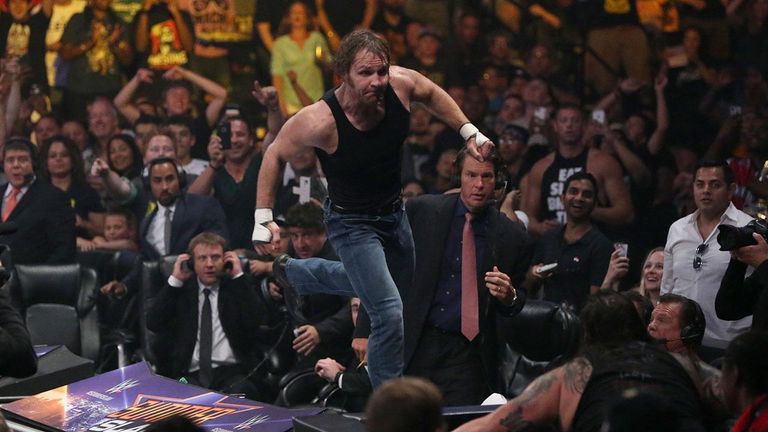 WWE SummerSlam 2015 - Dean Ambrose on announce desk