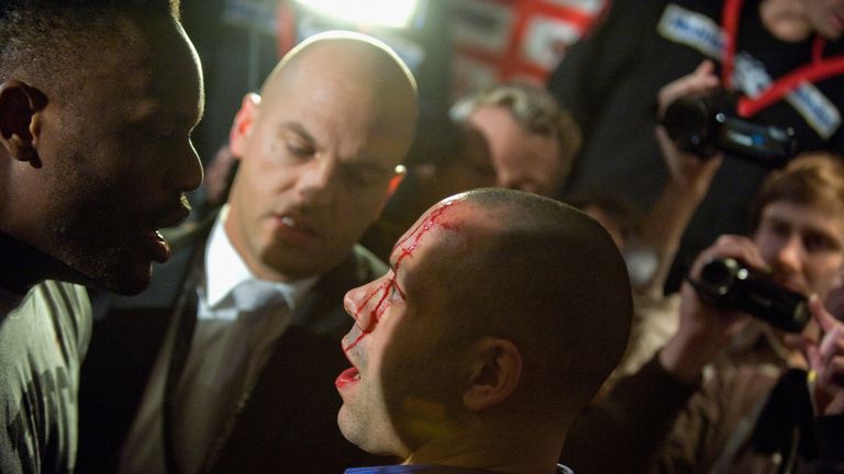 Haye's trainer Adam Booth (R) was left bloodied by the brawl