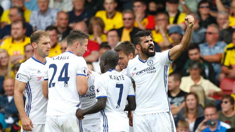 Diego Costa (R) celebrates scoring Chelsea's second goal