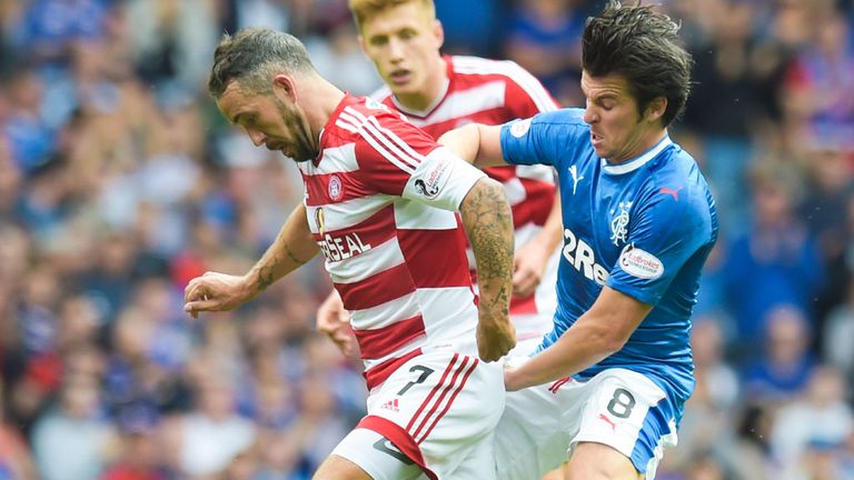 Hamilton's Dougie Imrie is challenged by new Rangers signing Joey Barton (right)