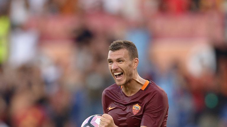 Roma forward Edin Dzeko celebrates