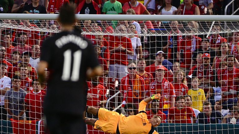 Edin Dzeko beats Alex Manninger with a 20-yard effort in the first half