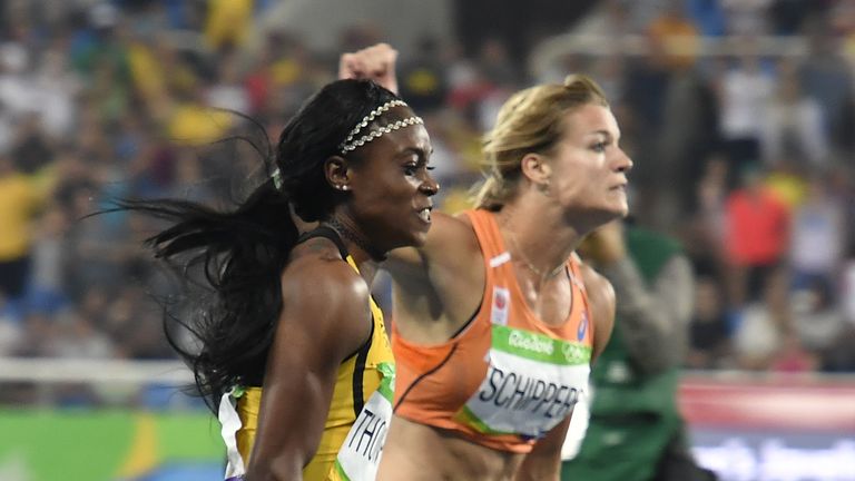 Jamaica's Elaine Thompson (L)  beats Dafne Schippers in the women's 200m final