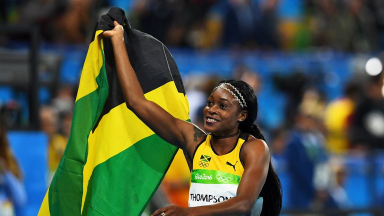 RIO DE JANEIRO, BRAZIL - AUGUST 13:  Elaine Thompson of Jamaica reacts after winning the Women's 100m Final on Day 8 of the Rio 2016 Olympic Games at the O