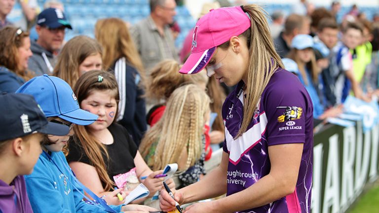 LEEDS, ENGLAND - JULY 30:  Ellyse Perry of Loughborough signs her autograph for fans after the inaugural Kia Super League women's cricket match between Yor