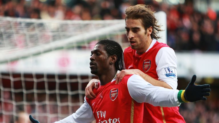 LONDON - JANUARY 12: Emmanuel Adebayor and Mathieu Flamini of Arsenal celebrate Adebayor's penalty during the Barclays Premier League match between Arsenal