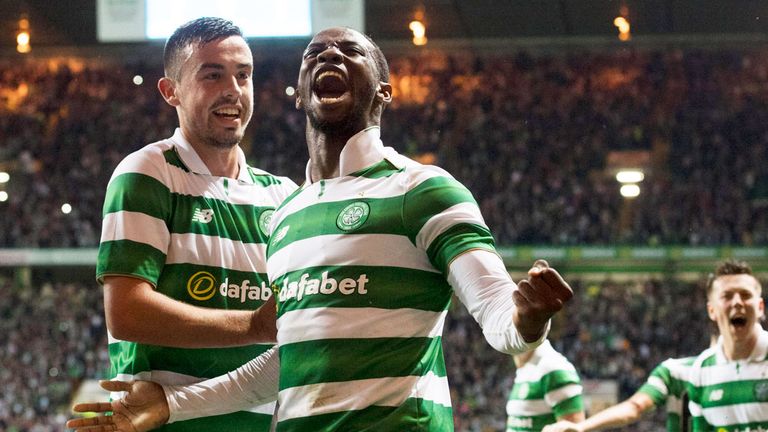 Eoghan O'Connell celebrates with Moussa Dembele after the striker's winning goal