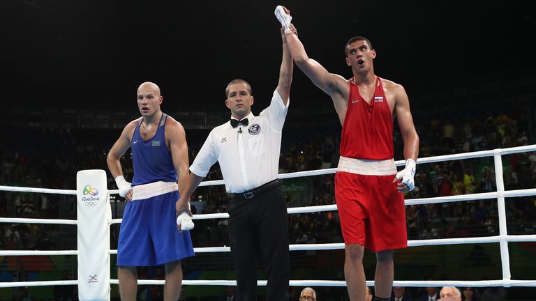 Evgeny Tischenko celebrates his controversial gold