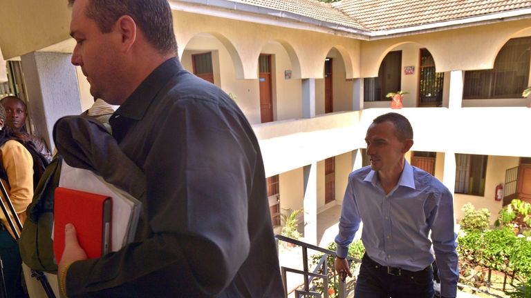 The agent of disgraced Kenyan marathoner Rita Jeptoo, Federico Rosa (L), and her coach Claudio Berardelli (R) 