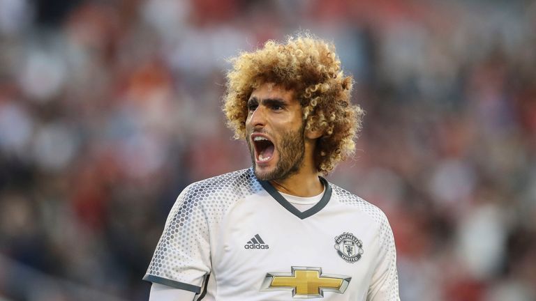 Marouane Fellaini celebrates during the Galatasaray v Manchester United pre-season friendly