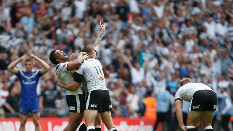 LONDON, ENGLAND - AUGUST 27:  Fetuli Talanoa and Gareth Ellis of Hull FC celebrate after winning the Ladbrokes Challenge Cup Final between Hull FC and Warr