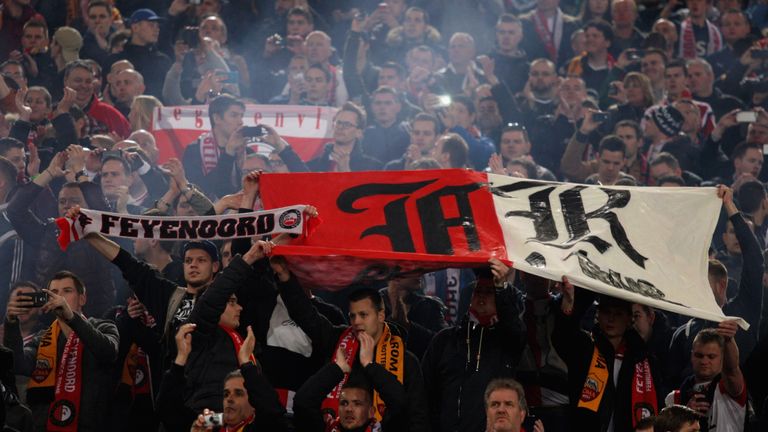 Feyenoord fans threw objects onto the pitch and lit fireworks against Roma