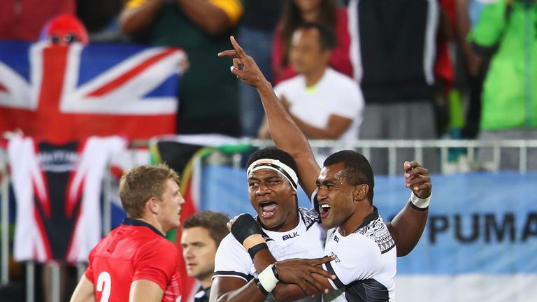 RIO DE JANEIRO, BRAZIL - AUGUST 11:  Viliame Mata and Ro Dakuwaqa celebrate as they win gold after the Men's Rugby Sevens Gold medal final match between Fi