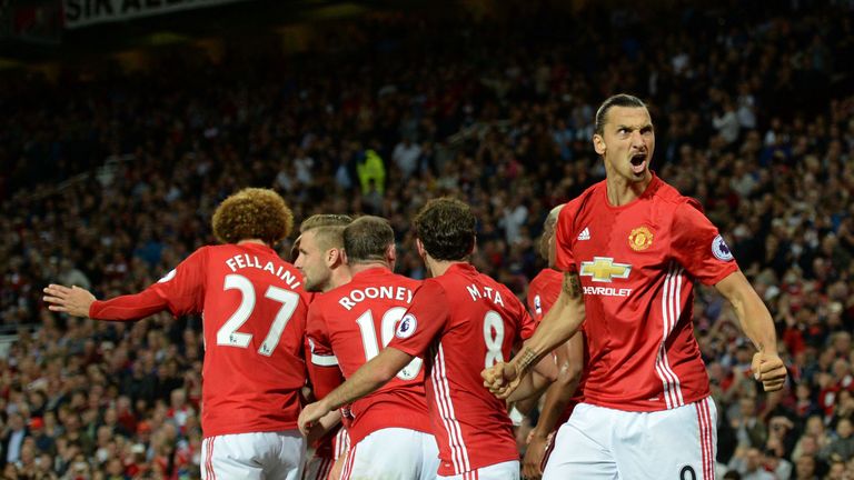 Zlatan Ibrahimovic (R) celebrates after scoring the second goal of the game