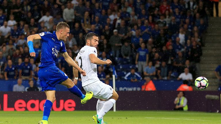 Leicester City's Jamie Vardy scores the first goal of the game