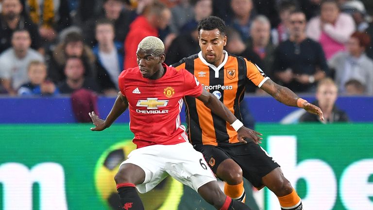 Manchester United's Paul Pogba battles with Hull City's Tom Huddlestone