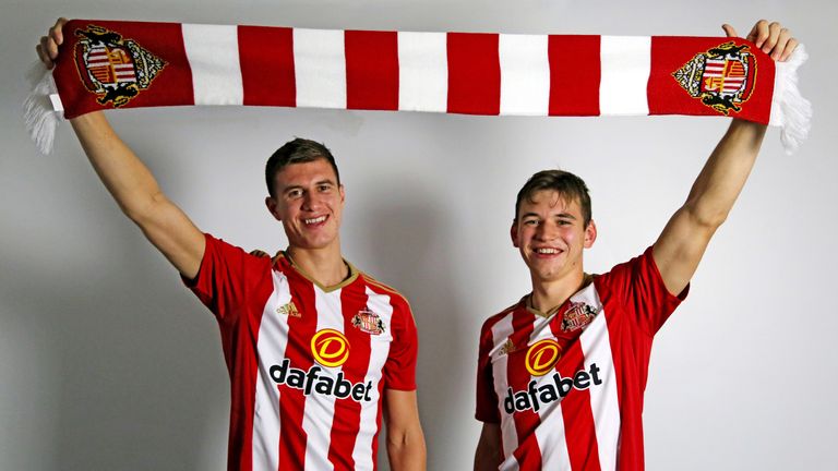 Paddy McNair (L) and Donald Love have signed permanent deals with Sunderland