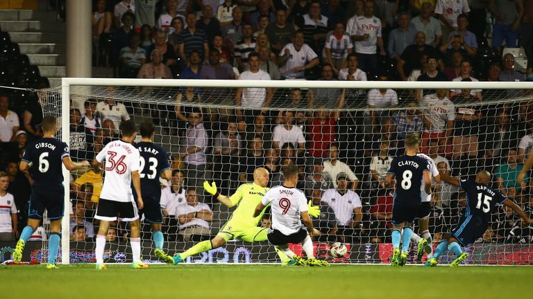 Lasse Vigen Christensen (blocked) of Fulham scores his team's second goal during the EFL Cup second round match between Fulham and Middlesbrough