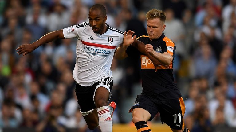 LONDON, ENGLAND - AUGUST 05:  Dennis Odoi of Fulham holds off pressure from Matt Ritchie of Newcastle during the Sky Bet Championship match between Fulham 
