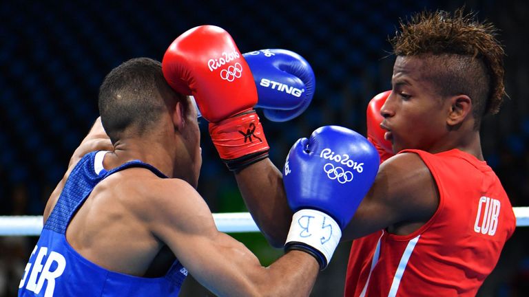 Cuba's Joahnys Argilagos (R) fights Great Britain's Galal Yafai during the Men's Light Fly (46-49kg) match at the Rio 2016 Olympic Games at the Riocentro -