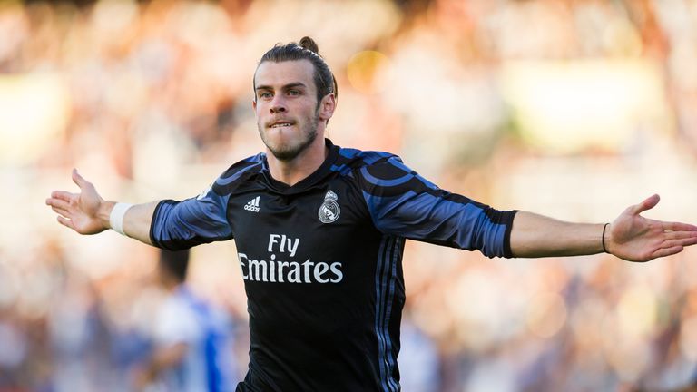 SAN SEBASTIAN, SPAIN - AUGUST 21:  Gareth Bale of Real Madrid celebrates after scoring goal during the La Liga match between Real Sociedad de Futbol and Re