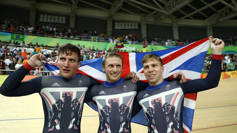 RIO DE JANEIRO, BRAZIL - AUGUST 11:  Callum Skinner, Jason Kenny and Philip Hindes of Great Britain celebrate after winning gold and getting an Olympic rec