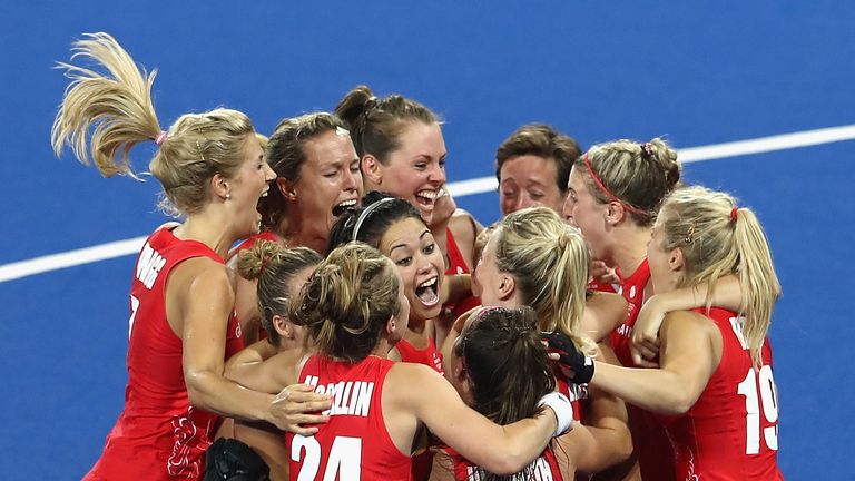 RIO DE JANEIRO, BRAZIL - AUGUST 19:  Great Britain players celebrating winning the shoot out against Netherlands to win the Women's Gold Medal Match on Day