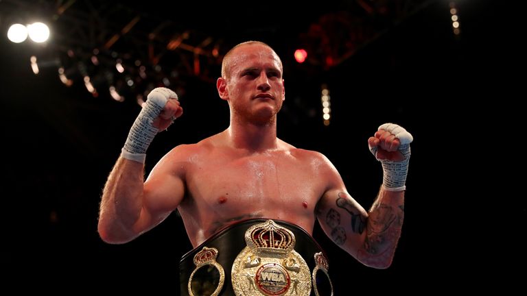 LONDON, ENGLAND - APRIL 09:  George Groves of England celebrates with the belt after defeating David Brophy of Scotland during the WBA International Super-
