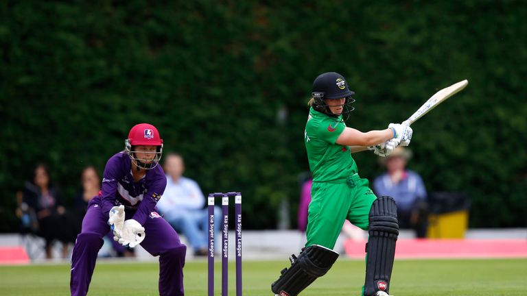 LOUGHBOROUGH, ENGLAND - AUGUST 05: Amy Jones of Loughbrough Lightning looks on as Heather Knight of Western Storm hits out during the Kia Super League wome