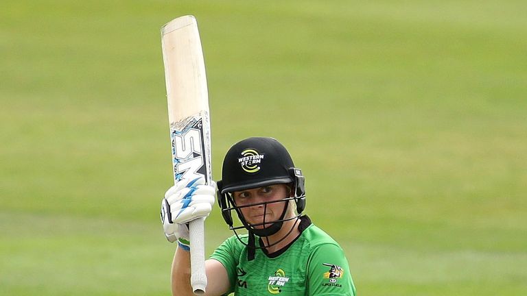 Heather Knight acknowledges the applause for her fifty
