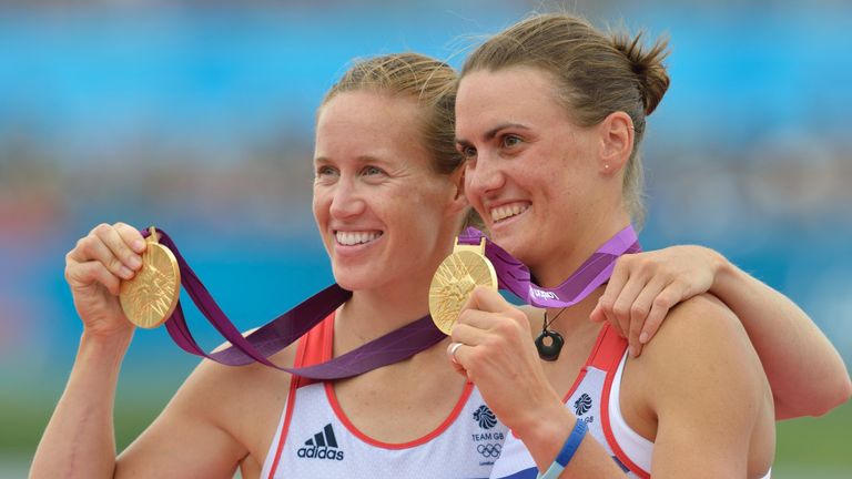 Great Britain's Helen Glover (L) and Heather Stanning pose with their gold medals at London 2012