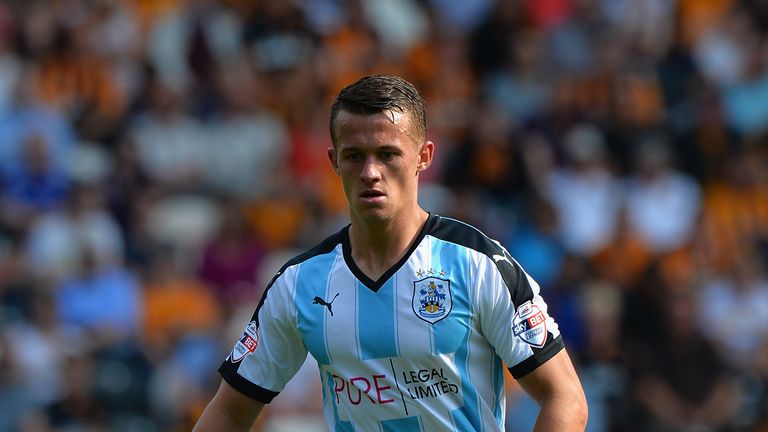 Jonathan Hogg scored his first goal in seven years to put Huddersfield top of the league.