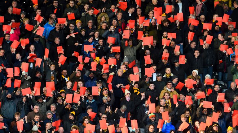 HULL, ENGLAND - APRIL 26:  Hull City fans protest a change to the membership terms before the Sky Bet Championship match between Hull City and Brentford on