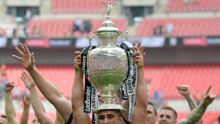 Hull FC's Danny Houghton celebrates with the Challenge Cup 