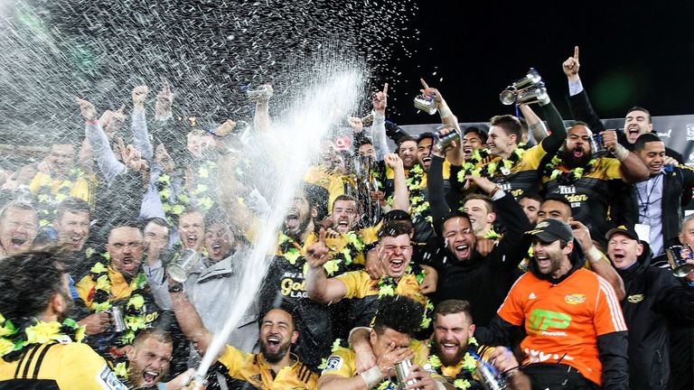 Members of the Hurricanes celebrate their victory after the Super Rugby Final between the Hurricanes and Lions of South Africa at Westpac  Stadium