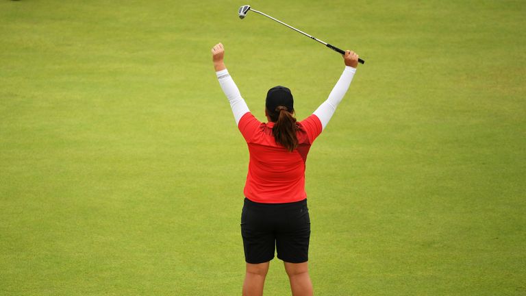 Inbee Park of Korea reacts on the 18th green after winning gold during the Women's Golf Final on Day 15 of the Rio Olympics