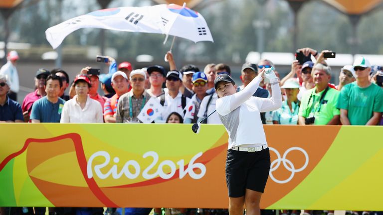 Inbee Park of Korea watches her tee shot on the first hole during the third round of the Women's Individual Stroke Pla