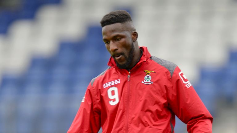 Inverness CT's new signing Lonsana Doumbouya warms up ahead of his debut