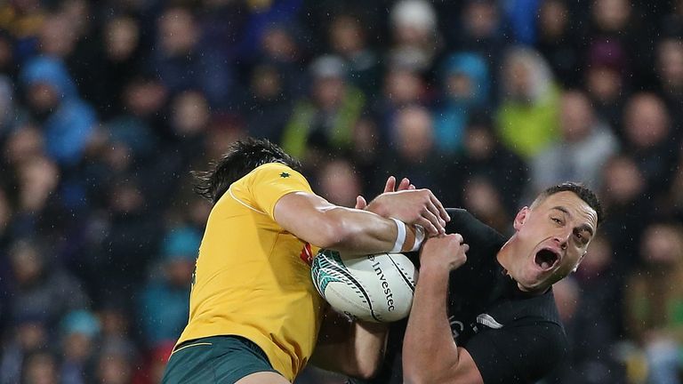 Israel Dagg of the All Blacks (R) challenges Adam Ashley-Cooper of the Wallabies (L) to the high ball during the Bledisloe Cup match