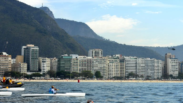 Burnell competes with other swimmers in the Men's 10km Marathon at Fort Copacabana