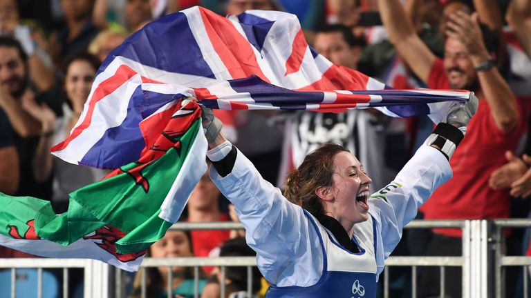 Great Britain's Jade Jones celebrates  after winning against Spain's Eva Calvo Gomez in  the womens taekwondo gold medal bout in the -57kg category as part