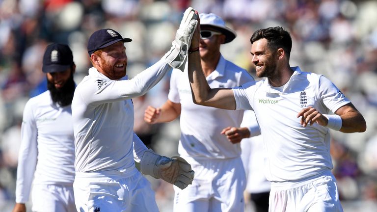 James Anderson (R) celebrates with Jonny Bairstow after taking the wicket of Pakistan's Yasir Shah